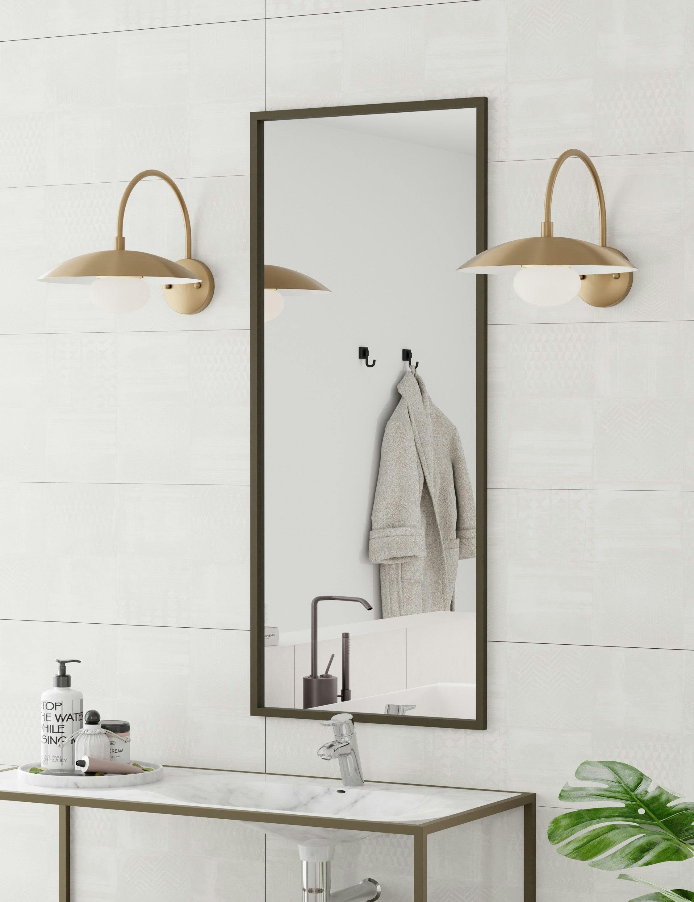 Modern Brass Curved Arm Sconce with Frosted Glass Globe